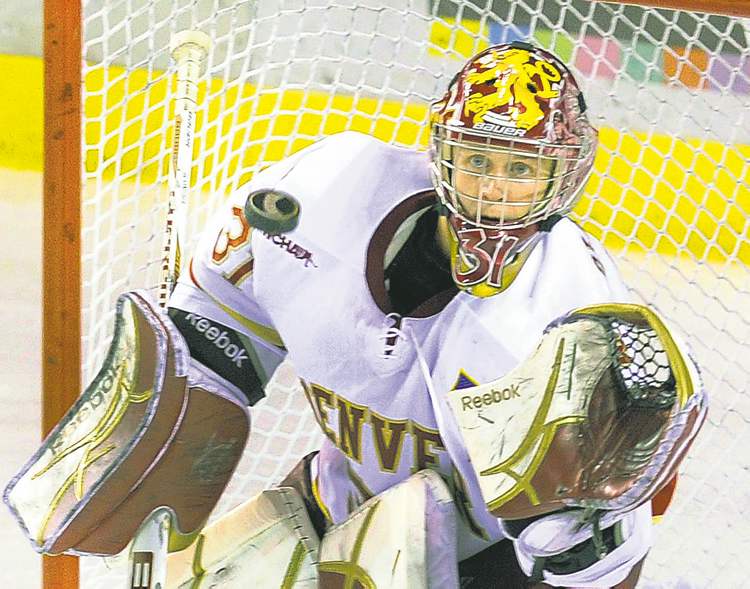 CP
Denver goalie Juho Olkinuora made a glove save in the third period Saturday. The University of Denver hockey team was shut out 4-0 by Minnesota Duluth at Magness Arena Saturday night Nov. 5, 2011. (AP Photo/Karl Gehring,The Denver Post)