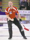 Jonathan Hayward / The Canadian Press
Brad Jacobs celebrates scoring three in the sixth end on the way to a 6-3 victory over Scotland Saturday and a trip to today's championship final.