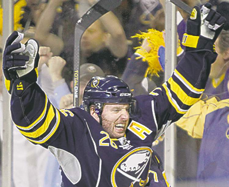 CP
FULL CLOSE CUT CLOSECUT - Buffalo Sabres' Thomas Vanek (26) of Austria, celebrates his goal against the Philadelphia Flyers during the first period in Game 6 of a first-round NHL Stanley Cup playoffs hockey series, in Buffalo, N.Y., Sunday, April 24, 2011. (AP Photo/David Duprey)