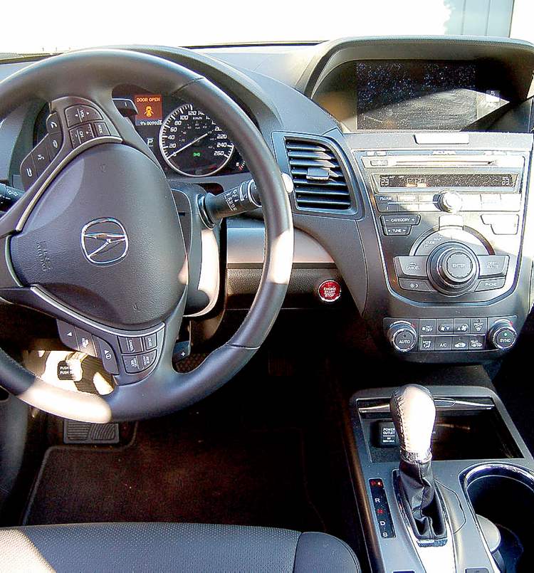 Postmedia
The instrument cluster and centre stack isn’t as overdone with buttons and controls
as other Acura models.