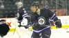 Bryan Little warms up with the team  Thursday at the MTS Centre. His numbers show the Jets centreman is proving his worth.