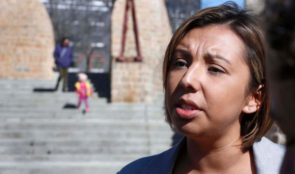 WAYNE GLOWACKI / WINNIPEG FREE PRESS
Kyra Wilson, Liberal candidate for Fort Richmond makes an announcement on Child and Family services Wednesday at the Oodena Celebration Circle (Sharing Circle) at The Forks.