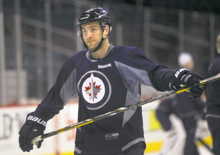 WAYNE GLOWACKI / WINNIPEG FREE PRESS
Jets D-man Grant Clitsome was again paired with Zach Bogosian during practice at the MTS Centre on Friday.