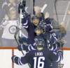 TREVOR HAGAN / WINNIPEG FREE PRESS
There were celebrations on both sides of the glass after Winnipeg�s Bryan Little (18) scored to tie the game 4-4 late in the third period.