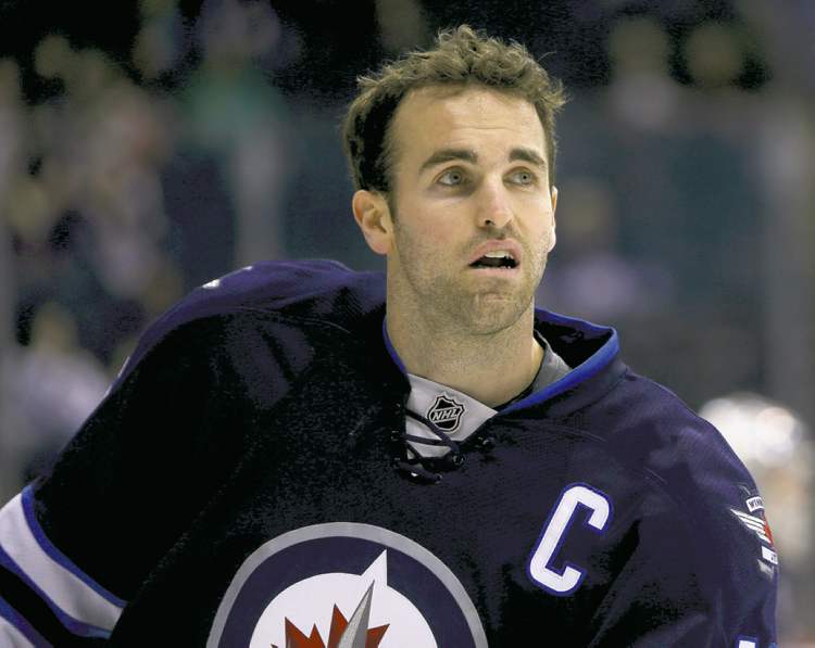 Winnipeg Jets' Andrew Ladd (16) during warmup as the Jets prepare to face the Philadelphia Flyers at MTS Centre in Winnipeg, Saturday, April 6, 2013. (TREVOR HAGAN/WINNIPEG FREE PRESS) closecut close cut