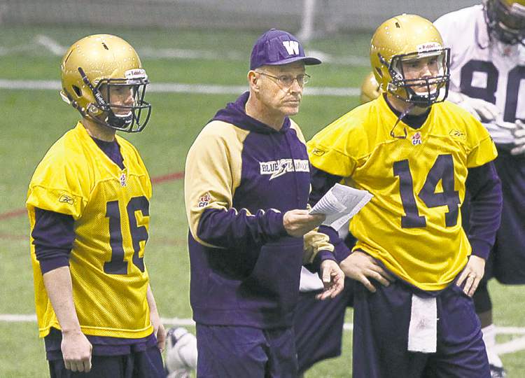 WAYNE GLOWACKI / WINNIPEG FREE PRESS
From left, #16 Max Hall, Offensive Coordinator Gary Crowton and #14 Chase Clement on the first day the Winnipeg Blue Bombers three day mini-camp held n the Winnipeg Indoor Soccer Complex Wednesday. Paul Wiecek story() Winnipeg Free Press April 24 2013