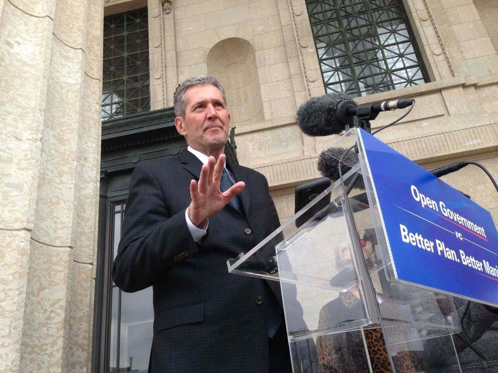 RUTH BONNEVILLE / WINNIPEG FREE PRESS
Leader Brian Pallister at his press conference on the steps of the Manitoba Legislative Building this afternoon.