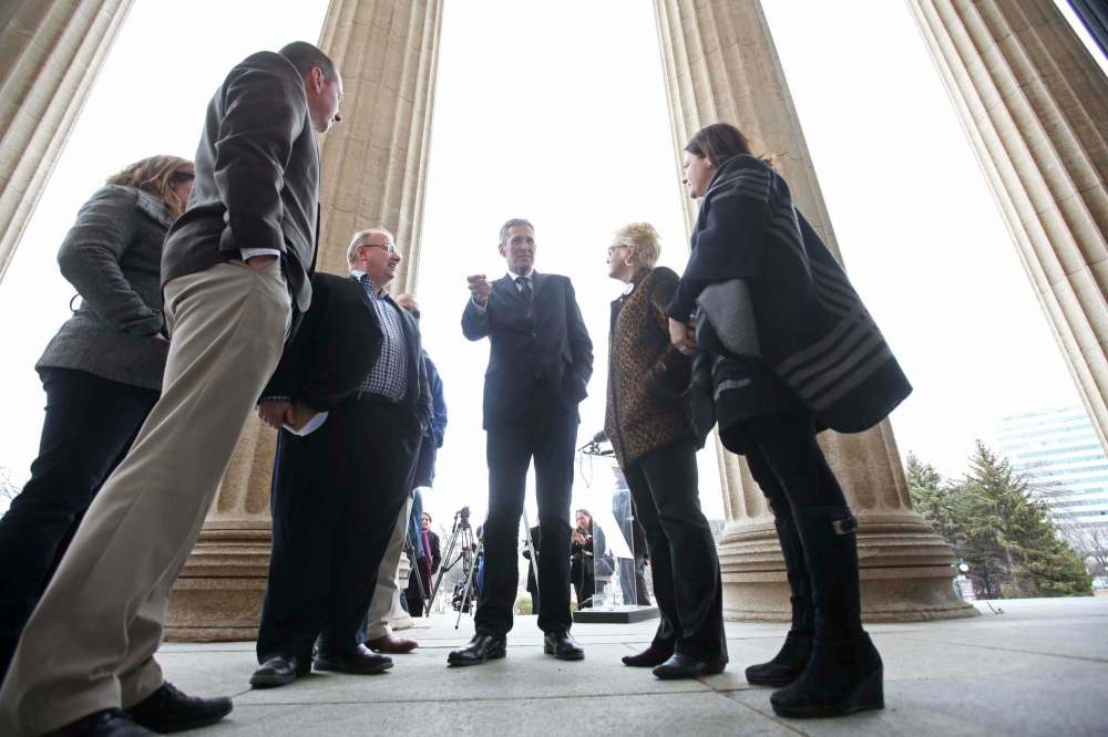 RUTH BONNEVILLE / WINNIPEG FREE PRESS
Progressive Conservative Leader Brian Pallister talks to PC candidates and concerned citizens on the steps of the Manitoba Legislative Building after holding a press conference illustrating a Vote Tax event – cheque made out to taxpayers of Manitoba Thursday afternoon.