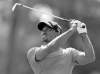 john raoux / the associated press
'Not real surprising that he's complaining about something,' Tiger Woods said Saturday after Sergio Garcia complained Woods deliberately invoked crowd noise while Garcia was swinging. Karma or not, it was Woods holding the trophy at the end.