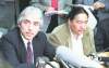 Gerry Cairns  / Winnipeg free Press Archives
Phil Fontaine (left) and Elijah Harper discuss the Meech Lake accord in June 1990.