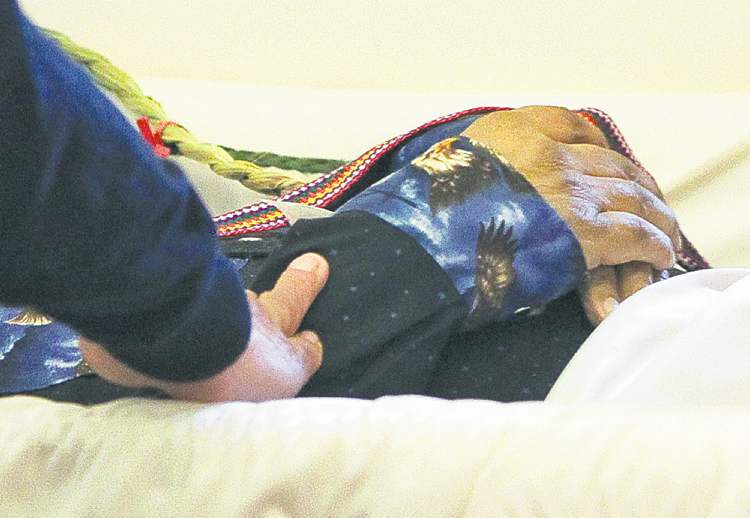 Mike Deal / Winnipeg Free Press
Mike Deal / Winnipeg Free Press 
Hundreds of mourners paid their final respects at the Manitoba legislature.