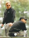 ELISE AMENDOLA / THE ASSOCIATED PRESS ARCHIVES
Fuzzy Zoeller (left) says his comments about Tiger Woods in 1997 are well in the past.