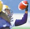 KEN GIGLIOTTI / WINNIPEG FREE PRESS
Kito Poblah makes one-handed catch in practice. The slotback says last season felt like his rookie year after sitting out the majority of 2011.