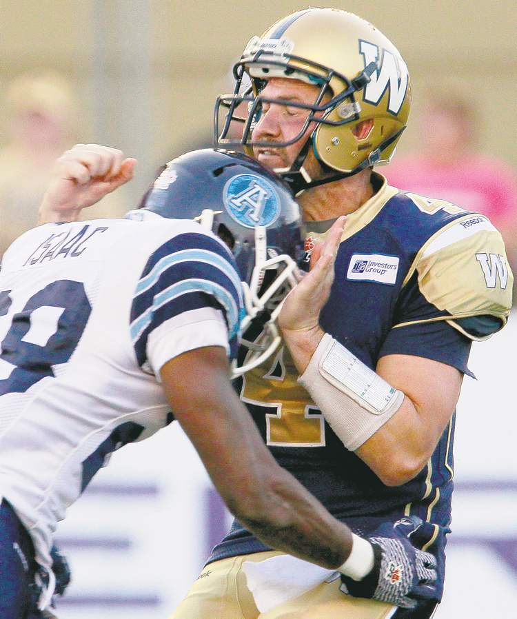 CP
Is Buck Pierce picking up bad vibrations from Bombers fans... or is he merely still vibrating from this hit by Argo Brandon Isaac on Sept. 29, 2012?