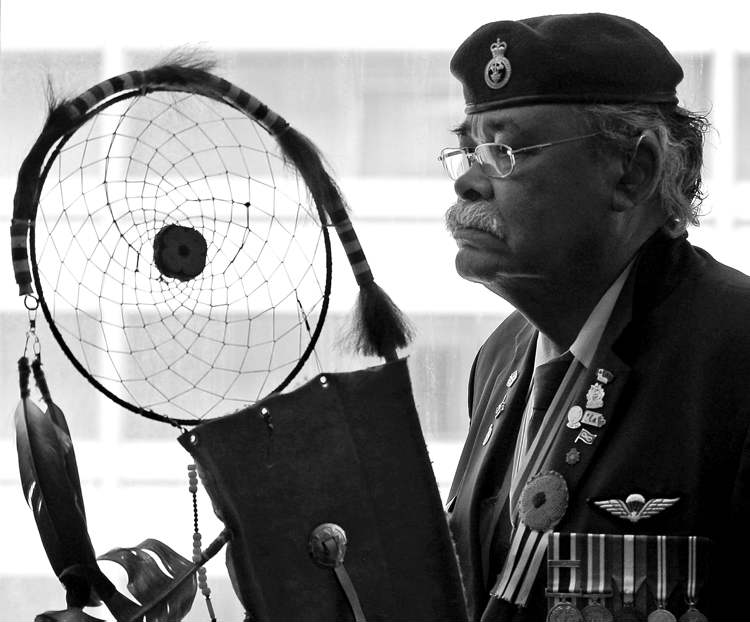 KEN GIGLIOTTI / WINNIPEG FREE PRESS
Sayisi Dene elder Joseph Meconse will carry his eagle staff as he leads the colour guard at the stadium.
