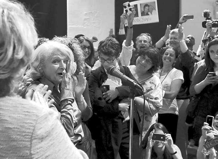 Richard Drew / The Associated Press
An ecstatic Edith Windsor addresses supporters at the LGBT Center, in New York, after the Supreme Court ruling Wednesday.