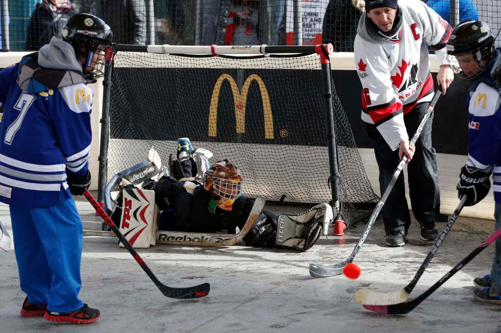 JOHN WOODS / WINNIPEG FREE PRESS
What else would children do at a Hometown Hockey event at The Forks but play hockey?