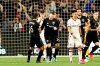 D.C. United defender Marquinhos Pedroso (6) congratulates forward Wayne Rooney, center, after Rooney scored on a penalty kick against Toronto FC during the second half of a soccer match, Saturday, June 29, 2019, in Washington. (AP Photo/Andrew Harnik)