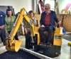 BORIS MINKEVICH / WINNIPEG FREE PRESS
Candidate Sharon Blady, from left, and OETIM exec dir Betty Lou Doerksen, watch as leader Greg Selinger works a simulator at the Operating Engineers Training Institute of Manitoba.