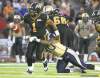 CP
Aaron Lynett / the canadian press
Tiger-Cats quarterback Henry Burris shakes off a tackle by Winnipeg Blue Bomber Marquis Frazier on Saturday night.