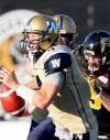 Aaron Lynett / THE CANADIAN PRESS archives
Winnipeg Blue Bombers quarterback Buck Pierce runs for his life against the Hamilton Tiger-Cats Saturday.