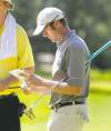 Wayne Glowacki / Winnipeg Free Press Josh Habig, the 2006 Players Cup champ, consults his yardage book during the practice round at Pine Ridge Wednesday.