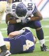 JOE BRYKSA / WINNIPEG FREE PRESS archives
Toronto Argonaut Cleyon Lang adds insult to injury after pulverizing Buck Pierce Friday night.