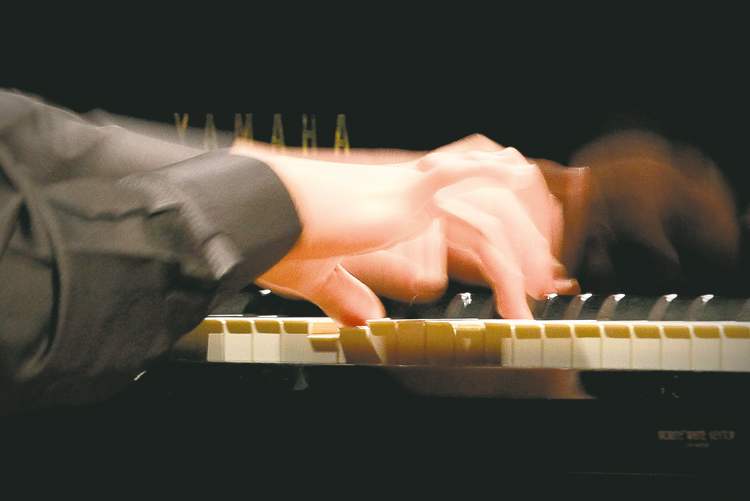 John Woods / Winnipeg Free Press archives
Albert Chen performs Rhapsody in C major, op. 11, no. 3 by Emo Dohnanyi in the Piano Solo, 20th/21st Century Composer, Diploma Class at the Winnipeg Music Festival held at the Winnipeg Art Gallery last March.