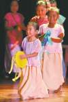 John Woods / Winnipeg Free Press 
'You'll leave your heart in the theatre,' reviewer says of the tiny dancers at the Pearl Of The Orient Philippine Pavilion.