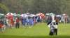 Bob Leverone /The Associated Press
Zach Johnson huddles with his caddy as the rains pelt down during the third round of the Wyndham Championship at Sedgefield Country Club in Greensboro, N.C. on Saturday. Johnson shot 65.