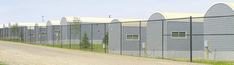 BARTLEY KIVES / WINNIPEG FREE PRESS
A row of temporary housing north of Williston, whose population has doubled in three years. While some of these developments cater to families, others are known as 'man camps.'