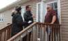 Gimli PC candidate Jeff Wharton (centre) and his wife Mickey speak to undecided voter Frank Harder while canvassing in Riverton, Man. on Friday, April 1, 2016.