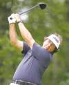 CP
Stew Milne / the associated pressPhil Mickelson thunders a drive on the second hole at TPC Boston.