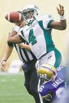 john woods / the canadian press
Riders QB Darian Durant gets wrapped up by Bombers' Alex Hall, one of eight sacks credited to the Blue Sunday.