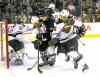 phil hossack / winnipeg free press
The Jets' James Wright is sandwiched by the Minnesota Wild's Clayton Stoner (left) and Erik Haula in front of the Wild net in second-period action Thursday.