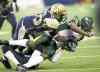 JOE BRYKSA / WINNIPEG FREE PRESS 
Blue Bomber Henoc Muamba tackles Edmonton Eskimos' Adarius Bowman.