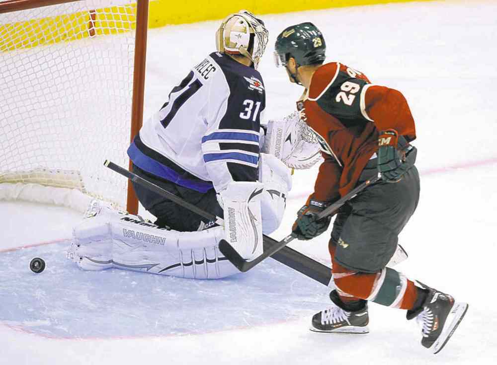 CP
Jason Pominville pots the OT winner behind Ondrej Pavelec.