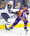 CP
Winnipeg Jet Zach Bogosian (left) and Edmonton Oilers� Mark Arcobello battle for the puck in the corner during the first period in Edmonton.