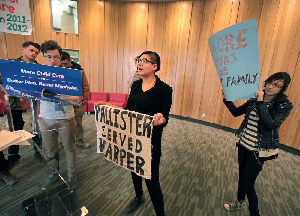 PHIL HOSSACK / WINNIPEG FREE PRESS
Sadie-Pheonix Lavoie (centre) and other activists waited in vain to confront Brian Pallister about child care issues Thursday. When he didn't show they took over the Conservative leader's podium and sign.