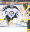 Liam Richards / the canadian press
Winnipeg Jets goalie Al Montoya stops a shot from Boston Bruins forward Chris Kelly during hockey action in Saskatoon on Friday.