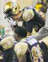 CP
John Woods / the canadian press archives
Winnipeg�s Jade Etienne gazes into oblivion on the sidelines as the Bombers are obliterated Friday night by the B.C. Lions.