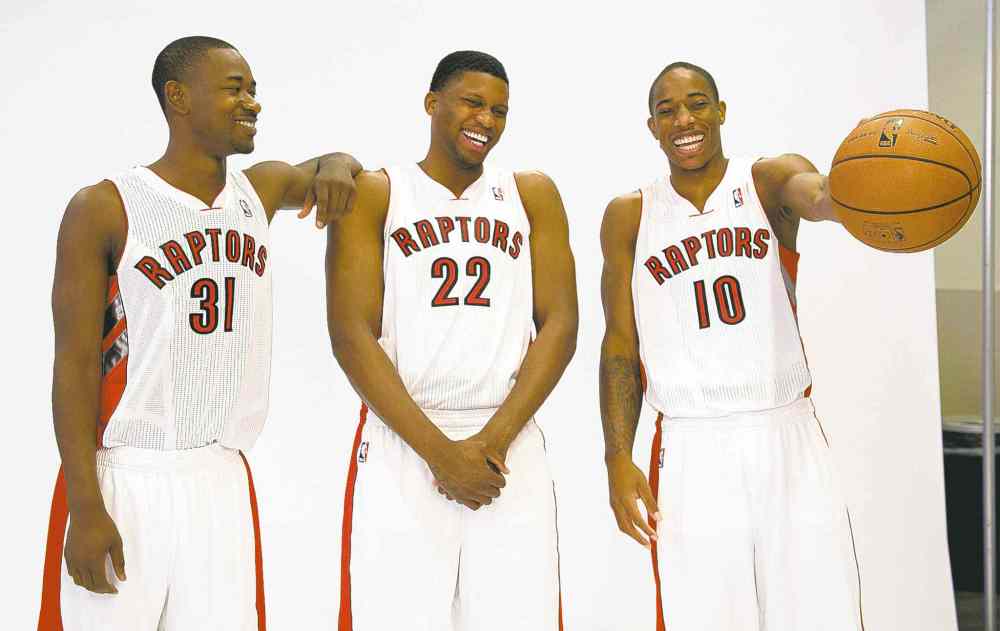 THE CANADIAN PRESS / Frank Gunn
Toronto Raptors player (from left) Terrence Ross, Rudy Gay and DeMar DeRozan pose for photos after it was announced Toronto will host the 2016 NBA all-star game.