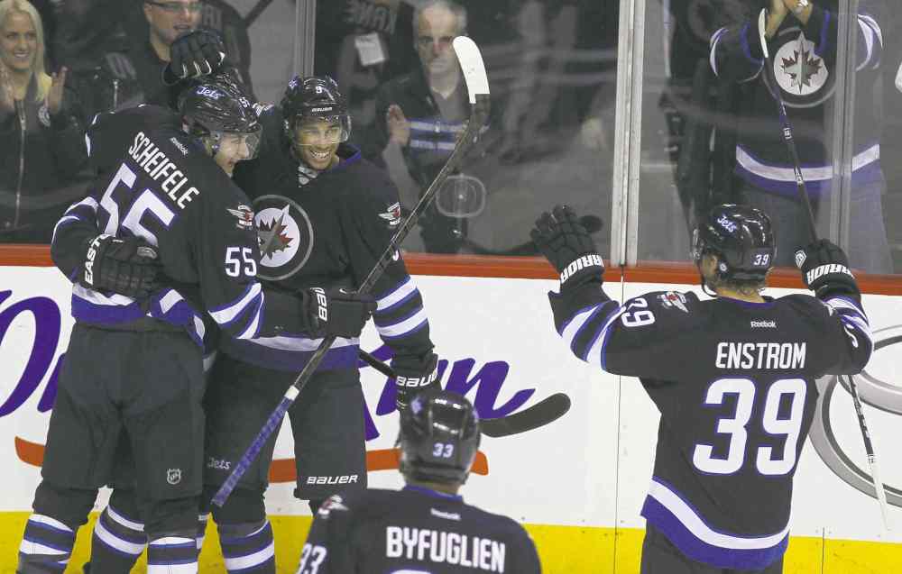 MIKE DEAL / WINNIPEG FREE PRESS
Winnipeg Jets Evander Kane and Mark Scheifele (55) whoop it up after a third-period goal against the Los Angeles Kings on Friday night at the MTS Centre.