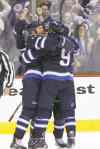 CP
John Woods / the canadian press archives
Jets teammates Olli Jokinen and Evander Kane celebrate a Jokinen goal Friday.