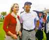 darron cummings / the associated press
U.S. team player Tiger Woods smiles with girlfriend Lindsey Vonn after the  U.S. won the Presidents Cup at Muirfield Village Golf Club in Ohio Sunday .