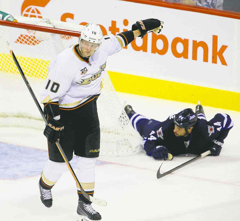 Trevor Hagan / the canadian press archives
Anaheim's Corey Perry (left) celebrates after capitalizing on Zach Bogosian's giveaway Sunday night.
