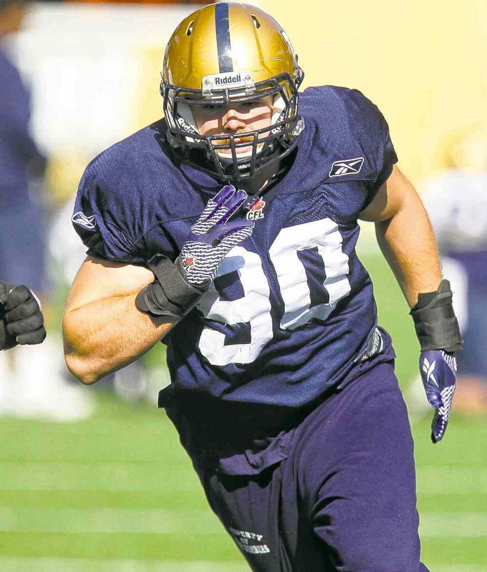 MIKE DEAL / WINNIPEG FREE PRESS
Bombers defensive end Greg Peach does a drill during practice at Investors Group Field Thursday.