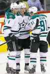 JOHN WOODS / THE CANADIAN PRESS
Stars Brenden Dillon (4), Jamie Benn (14) and Tyler Seguin (91) celebrate Benn's first-period goal.