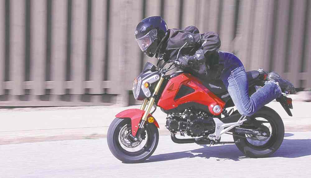Postmedia
David Booth rides the 2014 Honda Grom.
