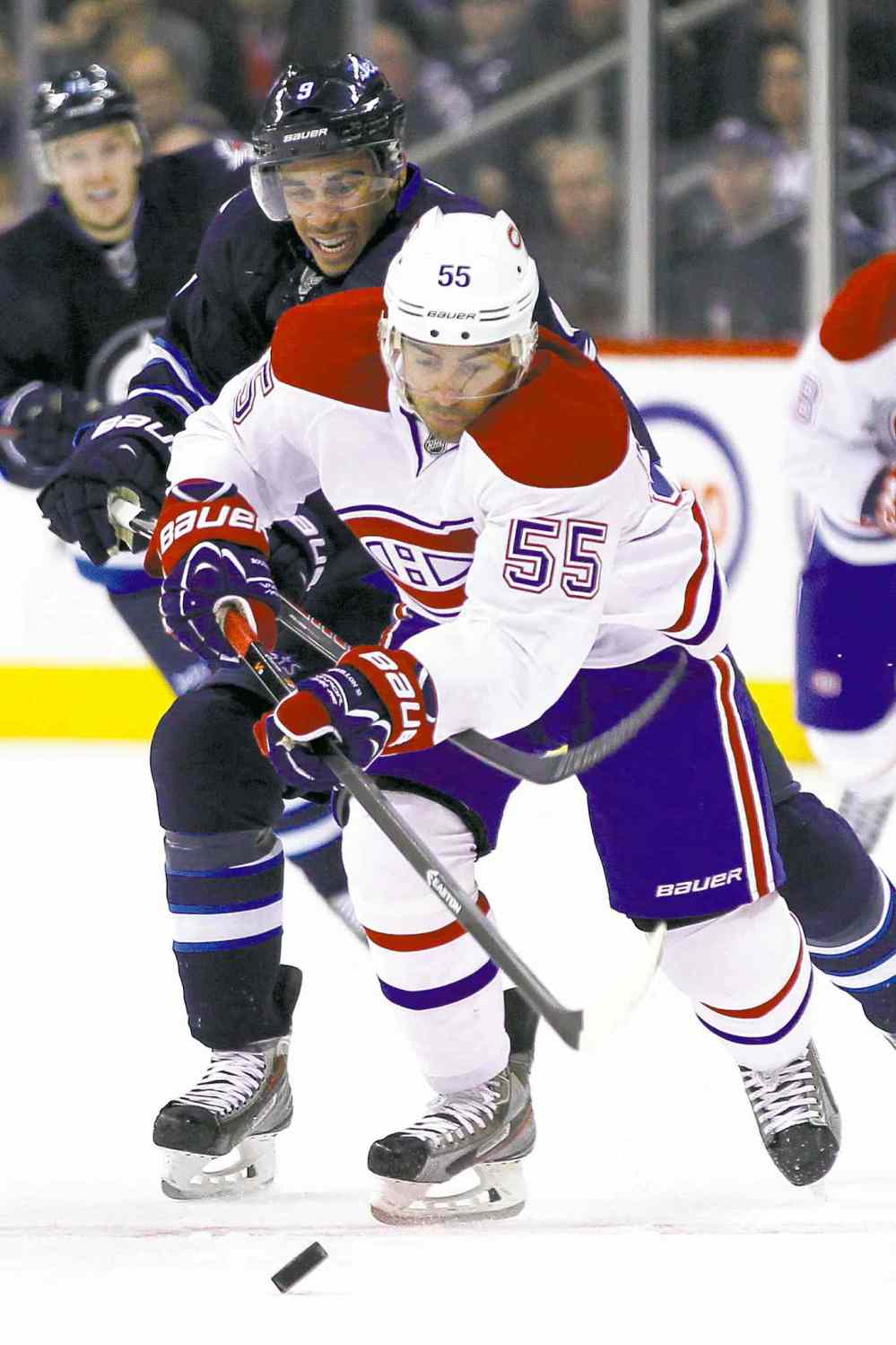 john woods / winnipeg free press
The Jets' Evander Kane gets a weak penalty for hooking not long after beaking off at officials over his last penalty Tuesday.